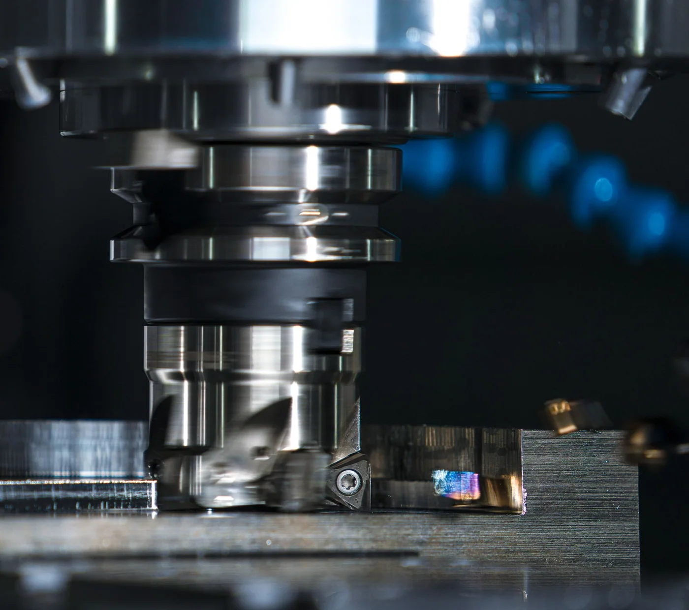 CNC cutting tool removing metal during an automated machining cycle